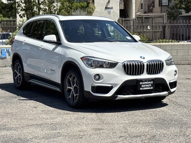 Used 2018 BMW X1 28i with VIN WBXHU7C38J5H44235 for sale in Glendale, CA